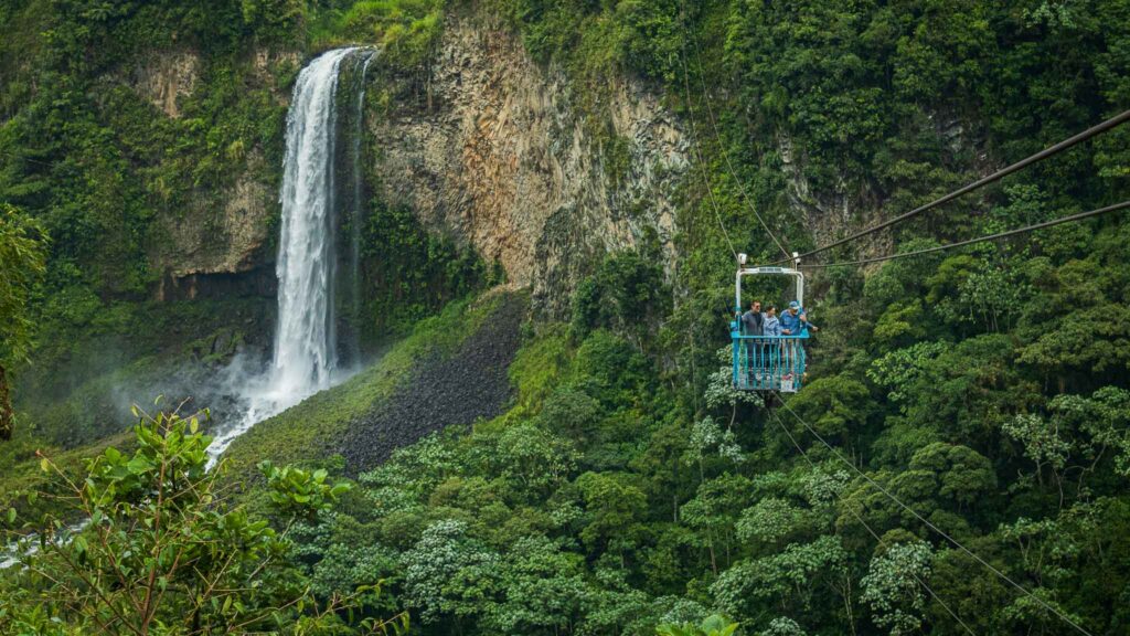 Group of people riding the cable car in Baños during their Ecuador experience
